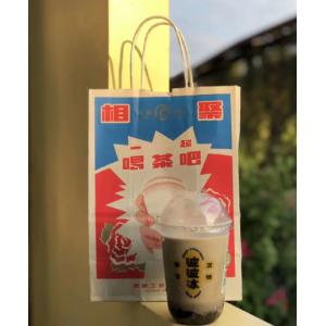 China Sac de magasinage en papier brun recyclable sur mesure imprimé avec poignées réutilisables supplier