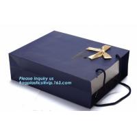 Le cadeau bleu épais de achat de luxe bon marché de papier d'emballage de transporteur met en sac avec les poignées de corde, sacs en papier de transporteur pour l'emballage de parfum