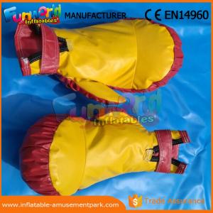 China Giant Inflatable Sports Games Yellow Inflatable Gloves For Boxing Fighting Games supplier