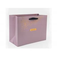 China Personalised gold hot stamping boutique paper bags with black ribbon handles on sale