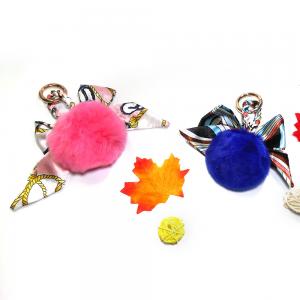 China Cute Pink Pom Pom Fur Ball Keychain Gold Metal Plating Purse Accessories supplier