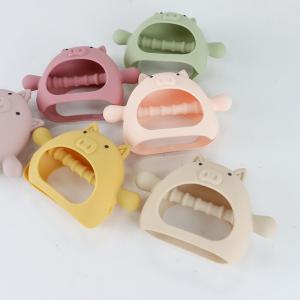 China Custom Various Shapes pig shape handle grip Silicone Teether for Baby with Various Designs supplier