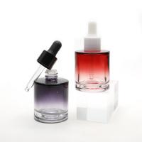 China Luxury Fat 40ml Glass Liquid Foundation Bottles Round Colored on sale