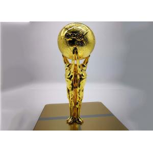 Shiny Gold Plated Custom Trophy Cup With The Statue Holding The Ball Design