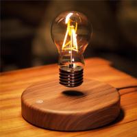 China Room Decoration Burlywood Magnetic Levitation Lamp Floating Light Bulb Desk Lamp on sale