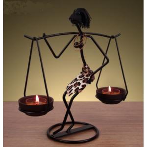 China Creative African Girls Iron Figure Candle Holder for Home Decoration supplier