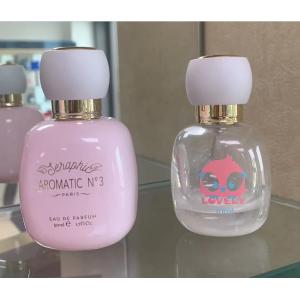 Cute Pink 30ml 50ml Round Luxury Perfume Bottles With Pump Sprayer