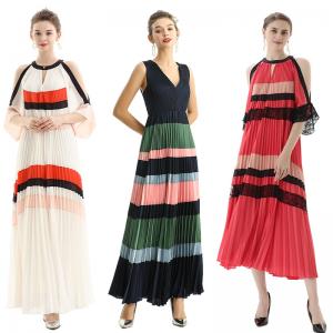 Resort dress- Elevating glam style with color block and fine details. Beautifully arranged in dancingly pleating.