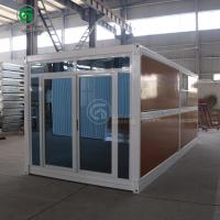 China Windproof And Warm 20ft Fold Out Container Homes Wood Grain Glass Manufacturer on sale