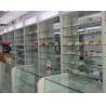 China Customized Pharmacy Storage Cabinets Medicine Display Racks Glass Layer wholesale