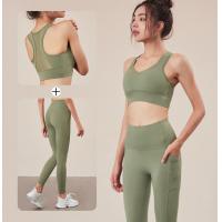China Sexy Fitness Sportswear Yoga Pants And Sports Bra Set Black Mesh  With Pockets on sale
