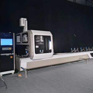 China Máquina de perforação CNC, fresagem, tapping, corte, acabamento, fresagem em perfis de alumínio, centro de usinagem CNC com 4 eixos controlados supplier