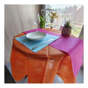 China 1.2mx50m PP Party Table Cloth Fabric Plain Non Woven Table Cover supplier