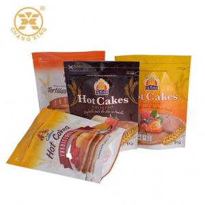 China Stand Up Mini Cake Roll Film Food Packaging Bag Mini Cake Packing Bag Barrier Biodegradable Laminated Bag supplier