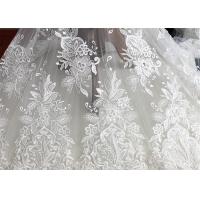 China Embroidery Floral Corded Ivory Lace Fabric By The Yard For Luxury Wedding Dress on sale