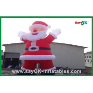 China Custom Red Inflatable Christmas Santa Claus With Bread Inflatable Cartoon Character supplier