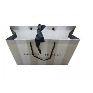 China Order Custom Printed Paper Merchandise Bag Business Packaging Online With Eyelet supplier