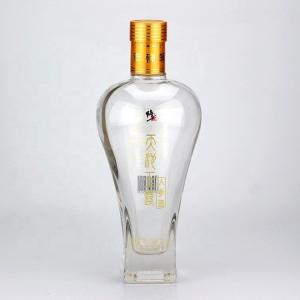 China Glass Sealing Type CROWN CAP 500ml 750ml Ginseng Liquor Bottle From Medicated Liquor supplier