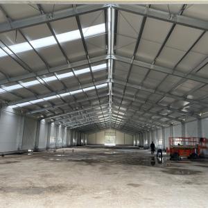 Q235 Prefabricated Steel Structure Warehouse Building With M20 Anchor Bolt Rockwool Wall Panel