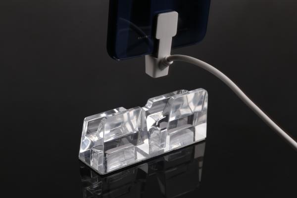El contador de fijación antirrobo de la seguridad del teléfono móvil de los dispositivos del ASISTENTE se coloca con el sensor de la alarma y el cordón de carga