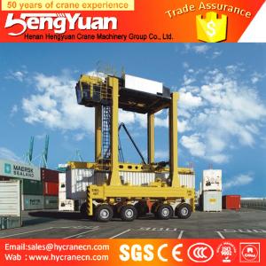 China 40t rubber tyre stacking container low profile Container gantry crane, staddle carrier supplier