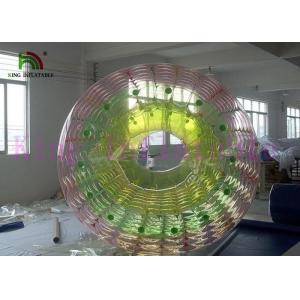 China Custom Rainbow Inflatable Water Toy / Roller PVC / TPU 2.4m x 2.8m Heat Sealed supplier