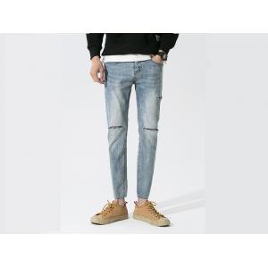 China 28-36 Lignt Blue Jeans Men'S Denim Pants With Rips Slim Fit Cotton Fabric supplier