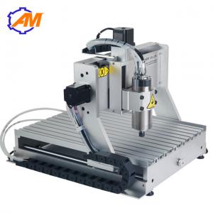 China AMAN3040 metal 3d cnc PCB engraving and milling machine automatic one step 3d 3040 4axis wood carving machine cnc router supplier