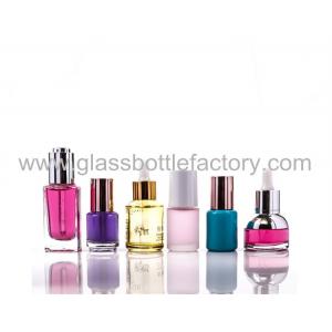 China High Quality New Design Colored Glass Essence Bottles With Droppers supplier