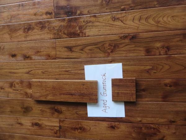 different stained Asian Teak solid hardwood flooring with distressed finishing