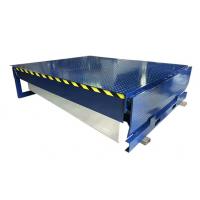 China Truck Unloading Cargo Forklift Use Stationary Hydraulic Electric Loading Dock Leveler with Foot Pedal Control Advantages on sale