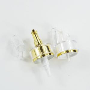 China Plastic Cap Luxury 24mm UV Plating Gold Color Lotion Dispenser Pump for Acrylic Bottle supplier