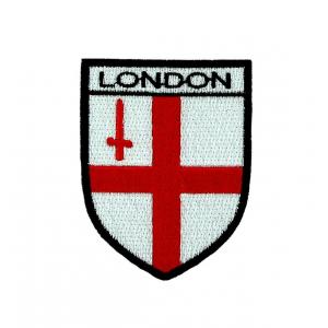La bandera BRITÁNICA del escudo de Inglaterra bordó el hierro de los remiendos en las insignias de la tela para los brazos de la capa