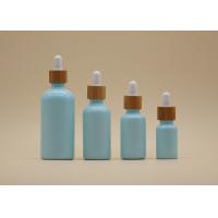 China Color Coating Sky Blue 15ml 30ml Essential Oil Bottles With Bamboo Dropper on sale