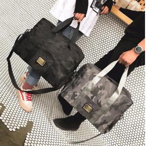 China New travel large luggage handbags travel travel bags short travel shoulder bags supplier