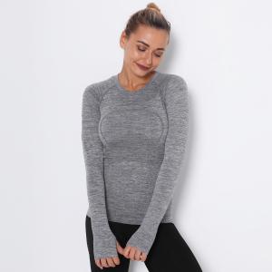 China Women's long-sleeved sports yoga t-shirt quick-drying round-neck yoga running shirt sweat-absorbing fitness clothes woma supplier