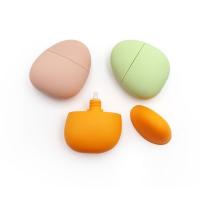 China 40ml Orange Pink Green Pebble Shape Empty Bottle For Sunscreen Lotion Hand Cream on sale