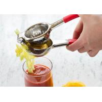 China Professional 304 Stainless Steel Lemon Squeezer with Silicone Handle Lemon Juice Press on sale