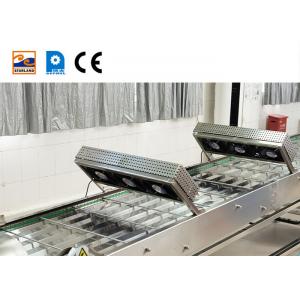 China Stainless Steel Cone Industrial Line Accessories Marshalling Cooling Conveyor supplier