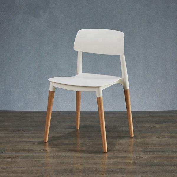 Contemporary Wooden Dining Chairs With White Plastic Sitting Surface