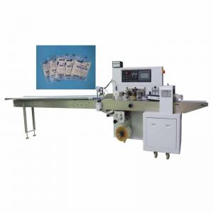 China Customized Automatic Pillow Packing Machine 2.8KW Gloves Packaging Machine supplier