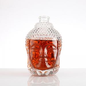 China Super Flint Glass Body Material Nordic Red Glass Gun Bottle for Whiskey Vodka Sale supplier