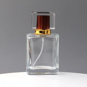 China Spot Square Transparent Glass Perfume Bottle Acrylic Cover Spray Press Travel Separate Bottle Cosmetics Sample Bottle supplier
