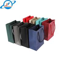 China New Custom Print Logo Gift High Quality Paper Bags Luxury Paper Shopping Bag With Ribbon Handle on sale