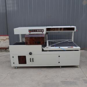 China Customized Automatic Plastic Wrap Sealer Machine POF / PE Film Shrink Wrapping Machine supplier
