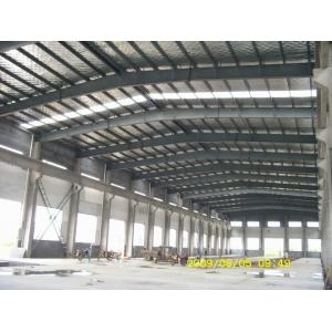 China steel structure frame workshop warehouse and sandwich panel wall roof and roller shutter door supplier