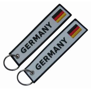 China 12C Pantone Remove Before Flight Keychain With Merrow Border wholesale