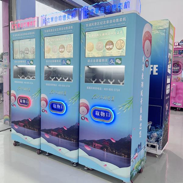 China 22 Inch Touchscreen Medal Vending Machine with 300-600 pcs Capacity and 150 W Power for Souvenir Coins wholesale