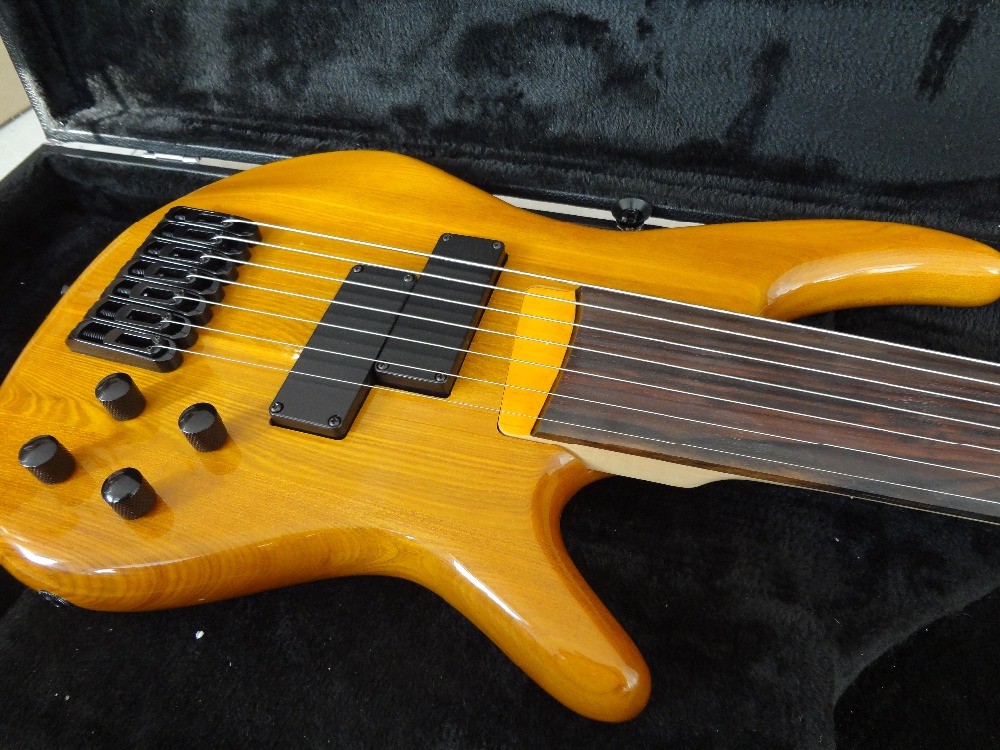 7 string bass guitar fretless electric bass guitar bolt on neck