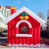 China 2.5m Red Inflatable Christmas Cottage with Santa on Chimney for Christmas Supplies wholesale